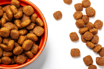 Healthy dog ​​food in bowl on white background