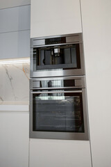 Built-in kitchen appliances in a modern kitchen