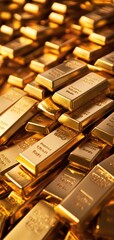 A close-up view of stacked gold bars showcasing their gleaming surfaces and intricate engravings.