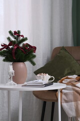 Create Cozy Holiday Decor with Lush Greenery and Soft Textures to Enhance Your Space