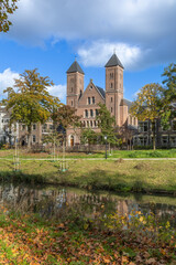 Old Catholic Gertrude's Cathedral along the Stadsbuitengracht. The Stadsbuitengracht is the canal around the old city center of the Dutch city of Utrecht.