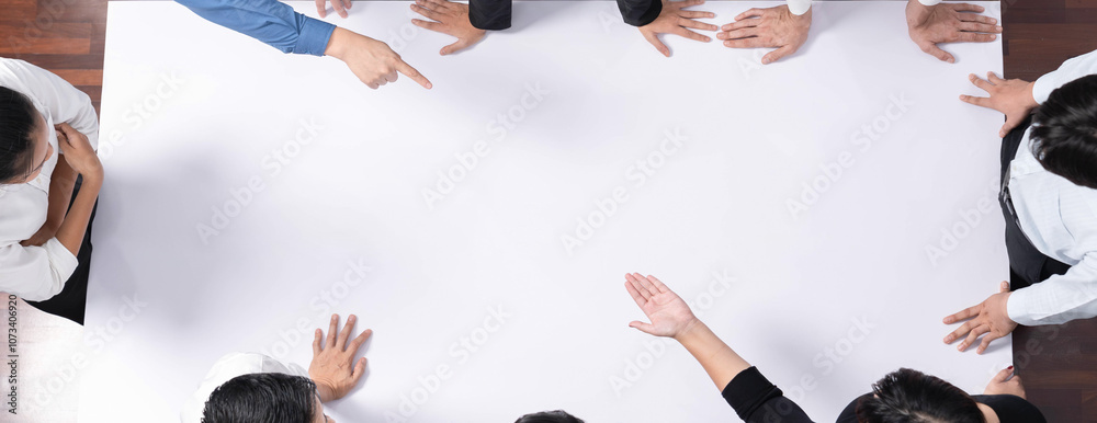 Leinwandbilder panorama banner top view of office worker and businesspeople on meeting table pointing to empty spac
