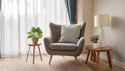 Comfortable armchair with cushions lamp, decorative plant and coffee table near light curtain in living room