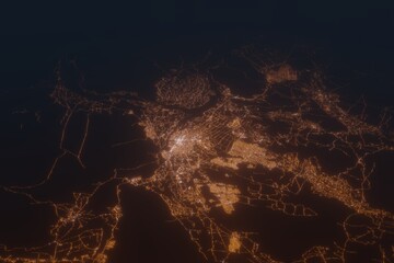 Aerial shot on Jelalabad (Afghanistan) at night, view from west. Imitation of satellite view on modern city with street lights and glow effect. 3d render
