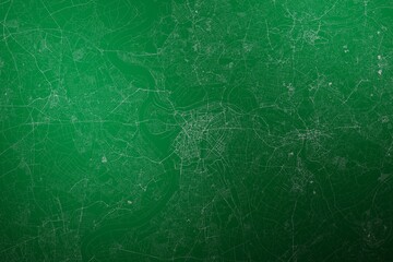 Map of the streets of Duisburg (Germany) made with white lines on abstract green background lit by two lights. Top view. 3d render, illustration