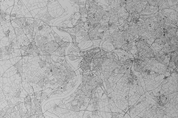 Map of the streets of Duisburg (Germany) made with black lines on grey paper. Top view. 3d render, illustration