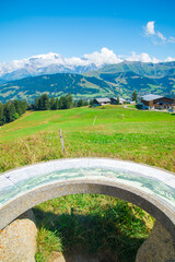 Map on a stone indicating the description of several alpine mountain peaks. In the blurred...