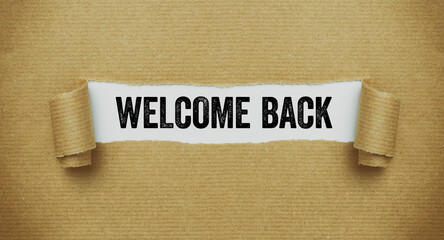 Torn paper revealing the words Welcome back