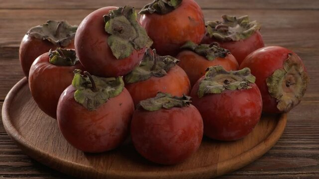 harvest of ripe persimmon chocolate kinglet food