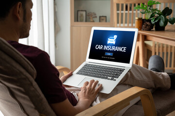 car insurance online website on computer screen for insure your car damage snugly