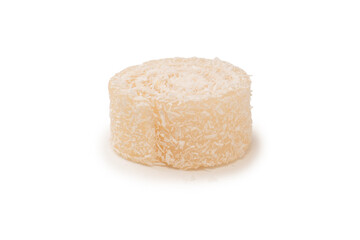 Coconut candy roll isolated on a white background.