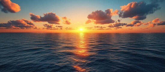 Obraz premium Dramatic Sunset Over the Ocean with Colorful Clouds.