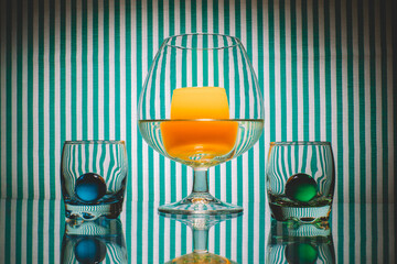 Glycerol in a glass on a striped background. 
