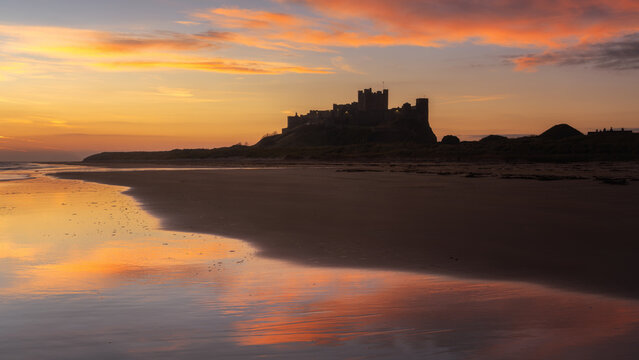 Bamburgh Castle at sunrise, Northumberland, England, UK