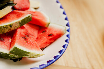 Watermelon Slices on White Plate with Blue Rim