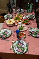 Festive table setting with traditional dishes and drinks for a celebration