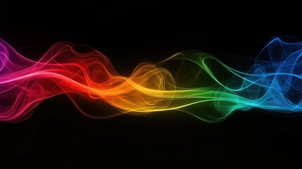 Fototapeta premium Abstract rainbow colored smoke flowing on a black background.