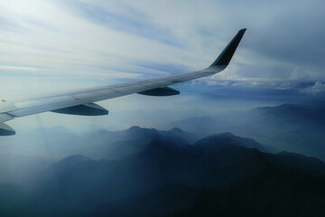 Amazing view of early morning Andes mountains from the airplane   in Peru