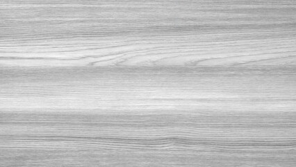 The image is of a wooden surface with a grainy texture. The wood appears to be unfinished, and the surface is covered in a white substance. Scene is somewhat eerie and unsettling