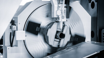 Cutting of metal with sparks fly from laser, modern industrial technology concept