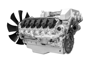A large engine with a black fan on the front. The engine is very large and has many parts isolated...