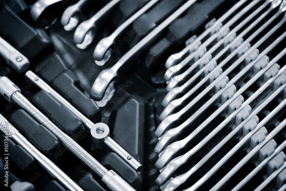 Aufkleber A toolbox with many different sized tools. The toolbox is black and white. The tools are arranged in rows and columns