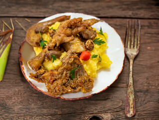 Traditional and rustic Brazilian dish, free-range chicken with polenta. Real food