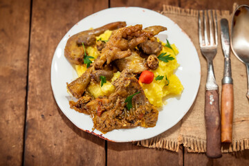 Traditional and rustic Brazilian dish, free-range chicken with polenta. Real food