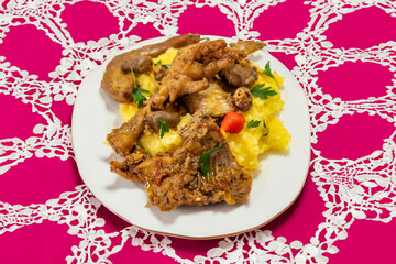 Traditional and rustic Brazilian dish, free-range chicken with polenta. Real food