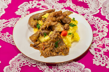 Traditional and rustic Brazilian dish, free-range chicken with polenta. Real food
