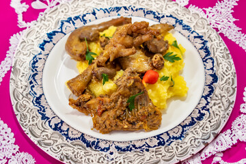 Traditional and rustic Brazilian dish, free-range chicken with polenta. Real food