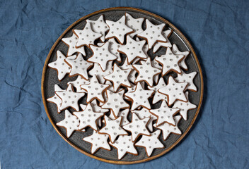 star shaped Christmas beautifully decorated gingerbread cookies