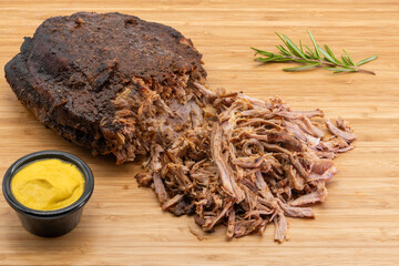 Delicious Pulled Beef Brisket seasoned with Mustard and fresh Rosemary