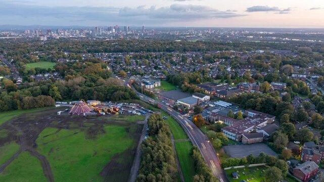 Aerial hyper-lapse video of Manchester cityscape on the evening from Heaton Park 