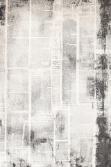 Obraz premium black and white antique newspaper page in grunge style, vintage background for design ideas