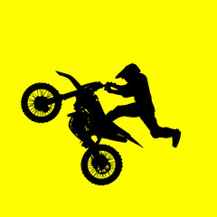 silhouette of a motocross rider in freestyle on a yellow background