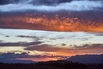 The sun dips below the hills of Chinchero, casting a golden embrace over this sacred land.Nature and history blend seamlessly as the day ends, reminding us of the timeless beauty of Peru’s Andes.