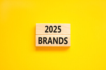 Planning 2025 brands new year symbol. Concept words 2025 Brands on beautiful wooden blocks. Beautiful yellow background. Business 2025 brands new year concept. Copy space.