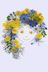 The girl's face is made of pressed flowers. Perfect for greeting cards, invitations, floral design