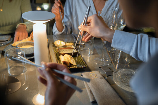 Modern restaurant dining experience asian cuisine elegant atmosphere luxury interior design lifestyle evening sophisticated ambiance