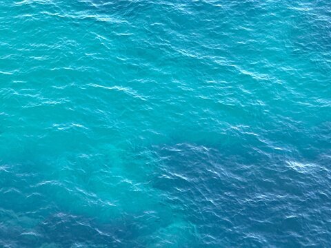 Blue water azure aqua surface background. 