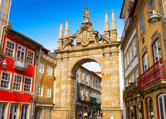 Fototapeta premium Arch of the New Gate (Arco da Porta Nova), late 18th-century baroque structure at the entrance to the historic old town. Braga, Portugal