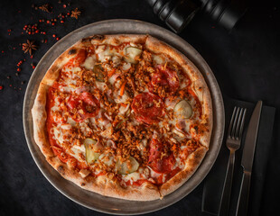Close-up of a pizza with various toppings