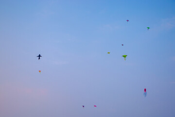 Kids Flying Kites Under a Clear Sky Peaceful and Joyful Outdoor Scene. High quality photo