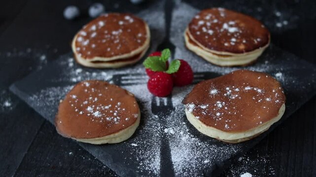 Delicious pancakes on a dark background. morning. food