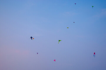 Kids Flying Kites Under a Clear Sky Peaceful and Joyful Outdoor Scene. High quality photo