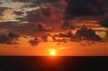 Fototapeta premium Photos of an unusual autumn sunset at sea
