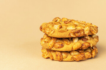 Crunchy Peanut Cookies with Golden Baked Texture on Neutral Background