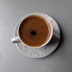 cup of coffee with beans