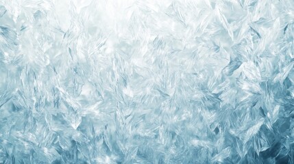 Obraz premium Close-up of intricate ice crystals creating a beautiful frozen texture in cool blue tones.